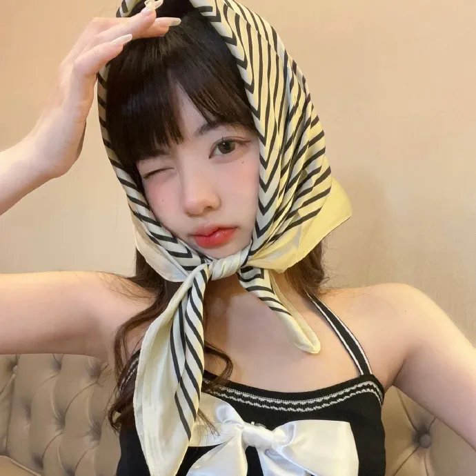 彼女